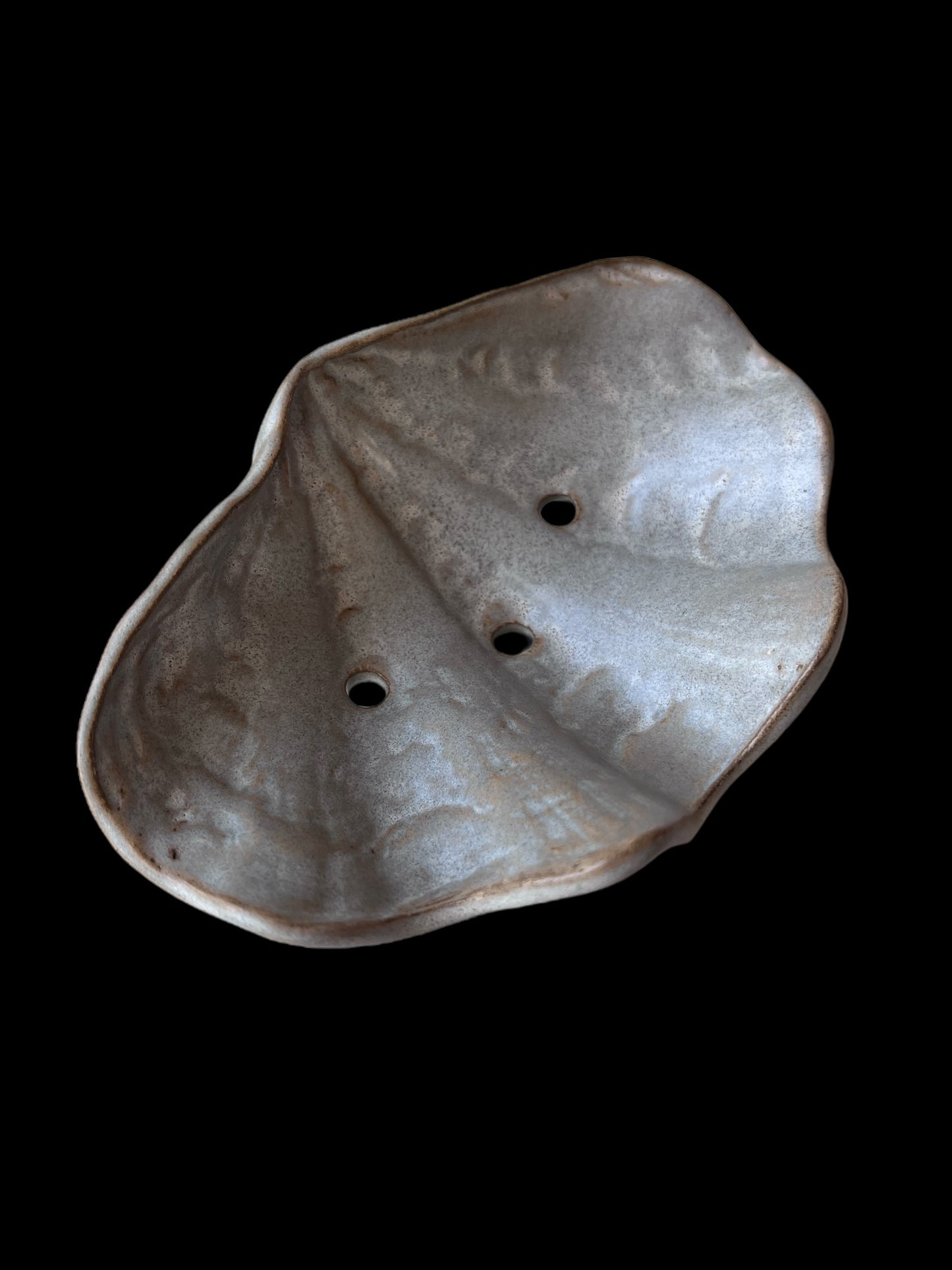 Vågig mussla på tre fötter