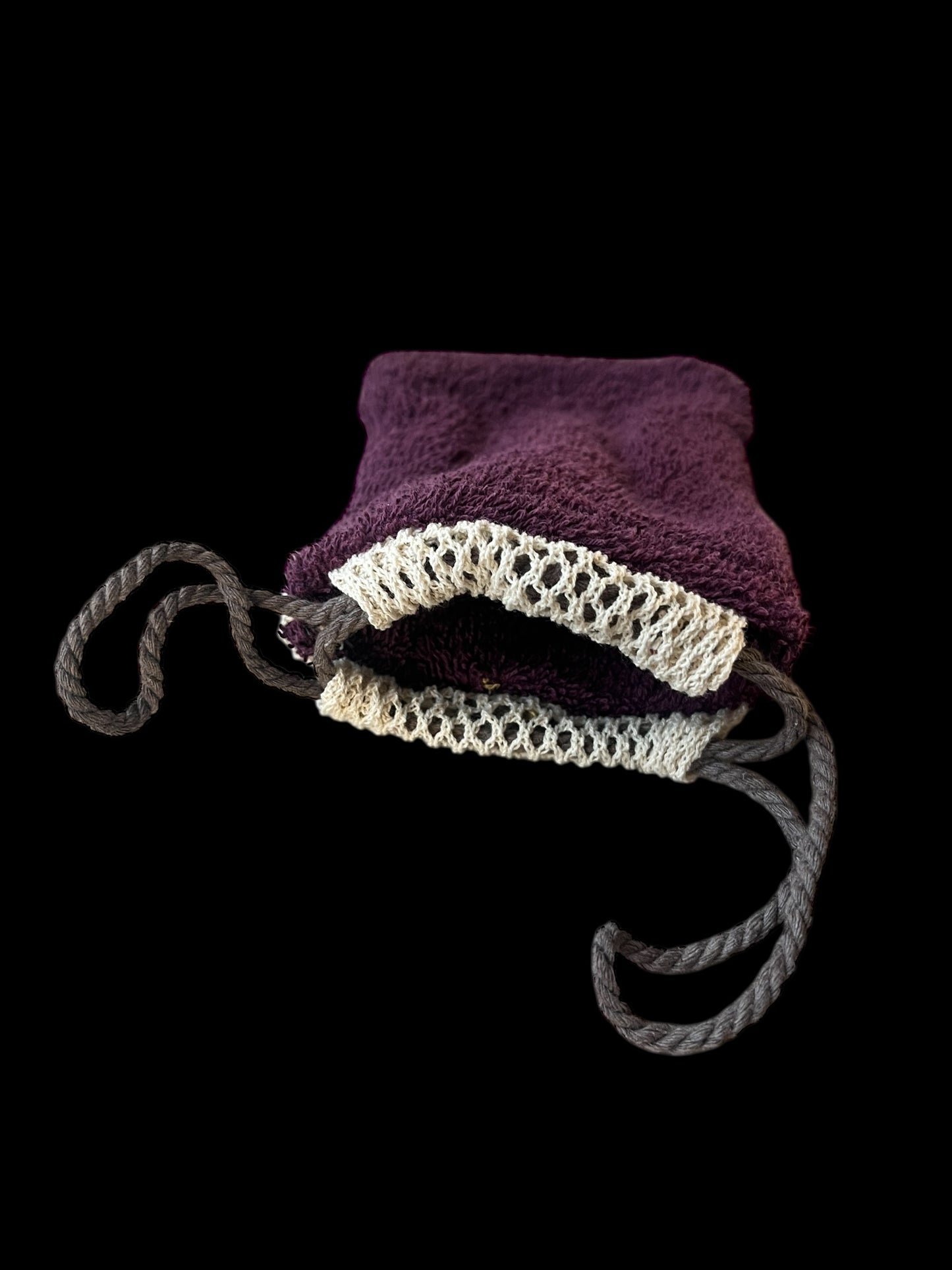 Exfolierande påse mörklila